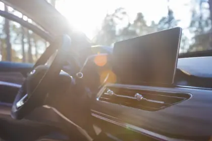 Car interior kept cool with UV and heat reduction window tint in Denton